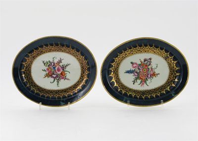 Appraisal: A pair of Worcester oval dishes painted with floral bursts