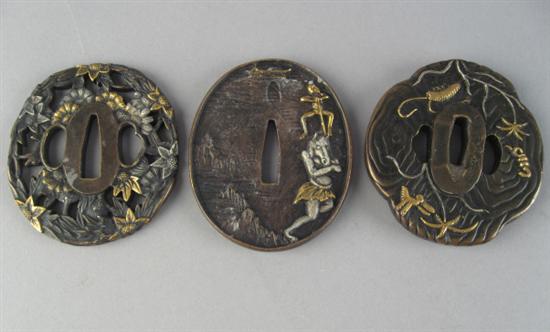 Appraisal: Three Japanese Tsubas with varying designs of figures and insects