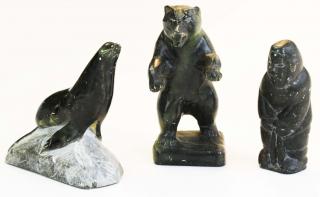 Appraisal: Inuit soapstone carved figures- bear signed Luke unsigned hunter seal