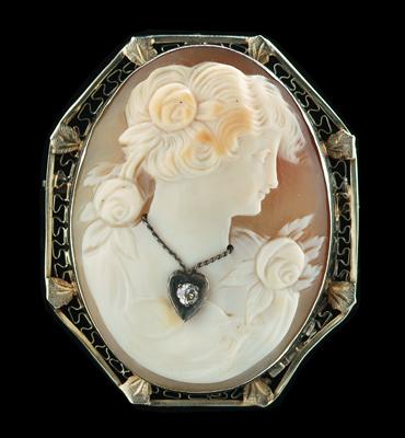 Appraisal: Diamond and cameo brooch carved shell bust of maiden attached