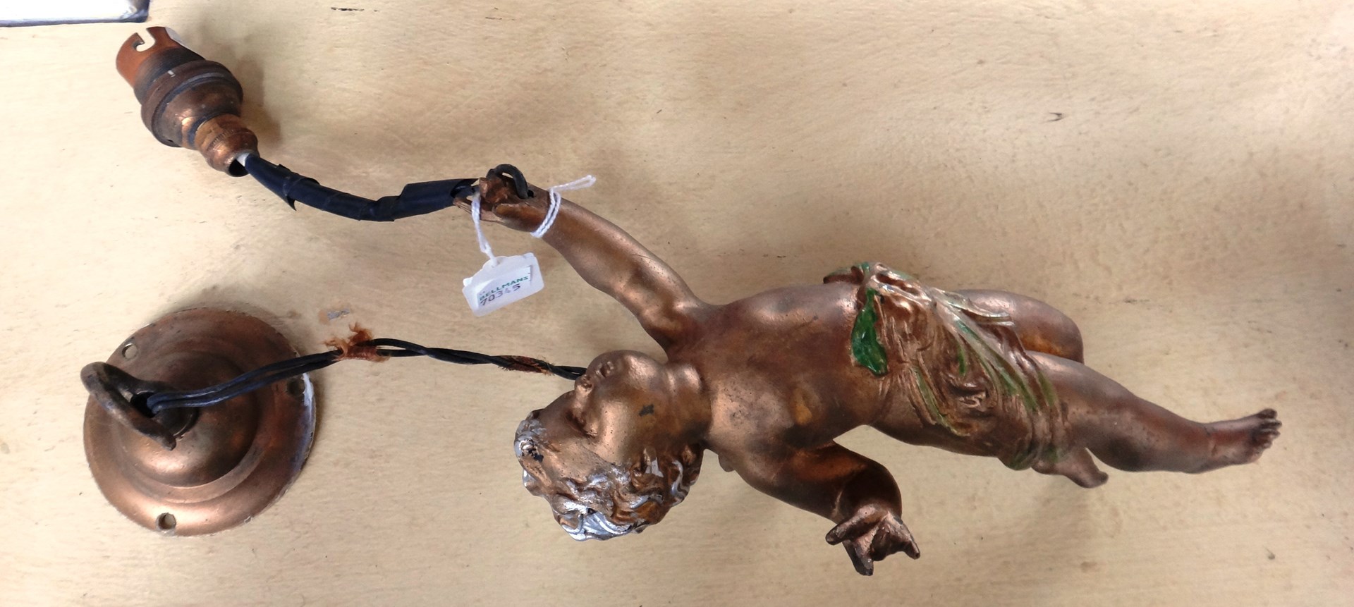 Appraisal: A gilt spelter figural ceiling light mid th century modelled