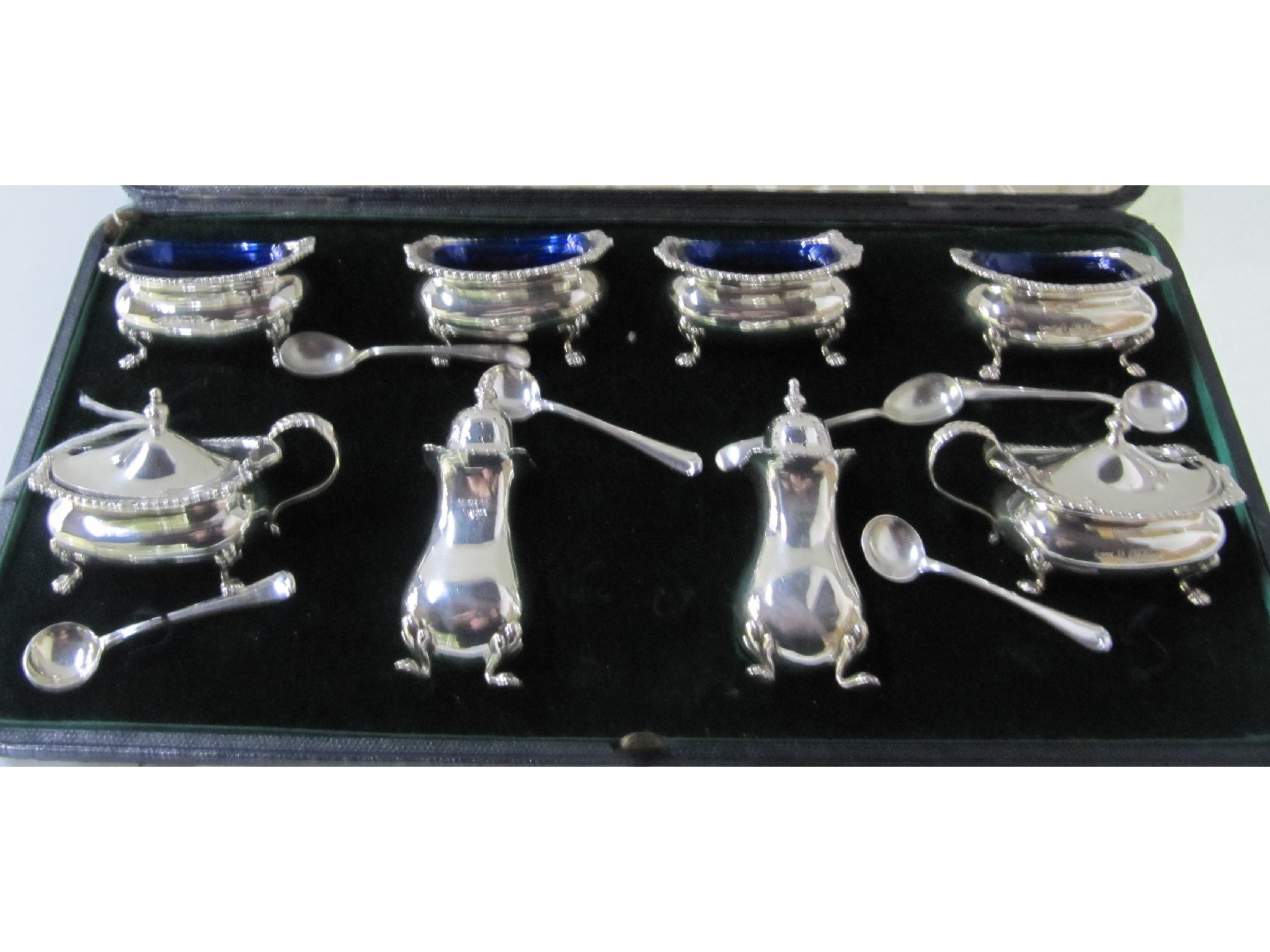 Appraisal: A cased eight piece silver condiment set Birmingham