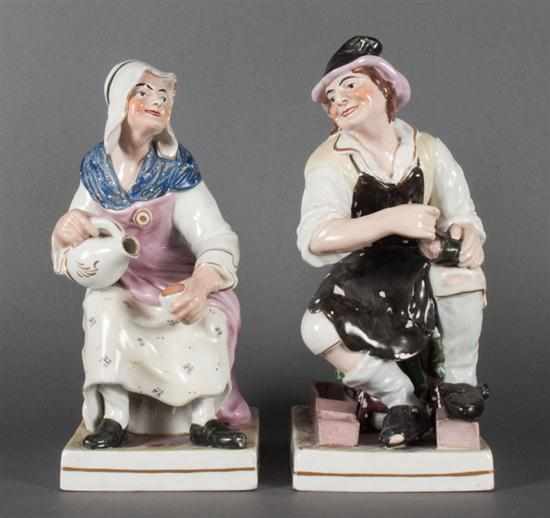 Appraisal: Pair Staffordshire style painted porcelain figures of the Cobbler and