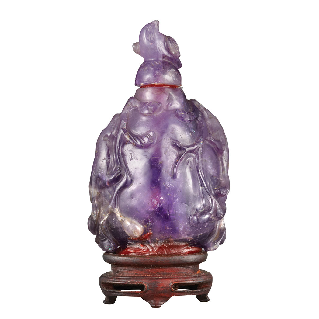 Appraisal: Chinese Amethyst Snuff Bottle th Early th century Carved in