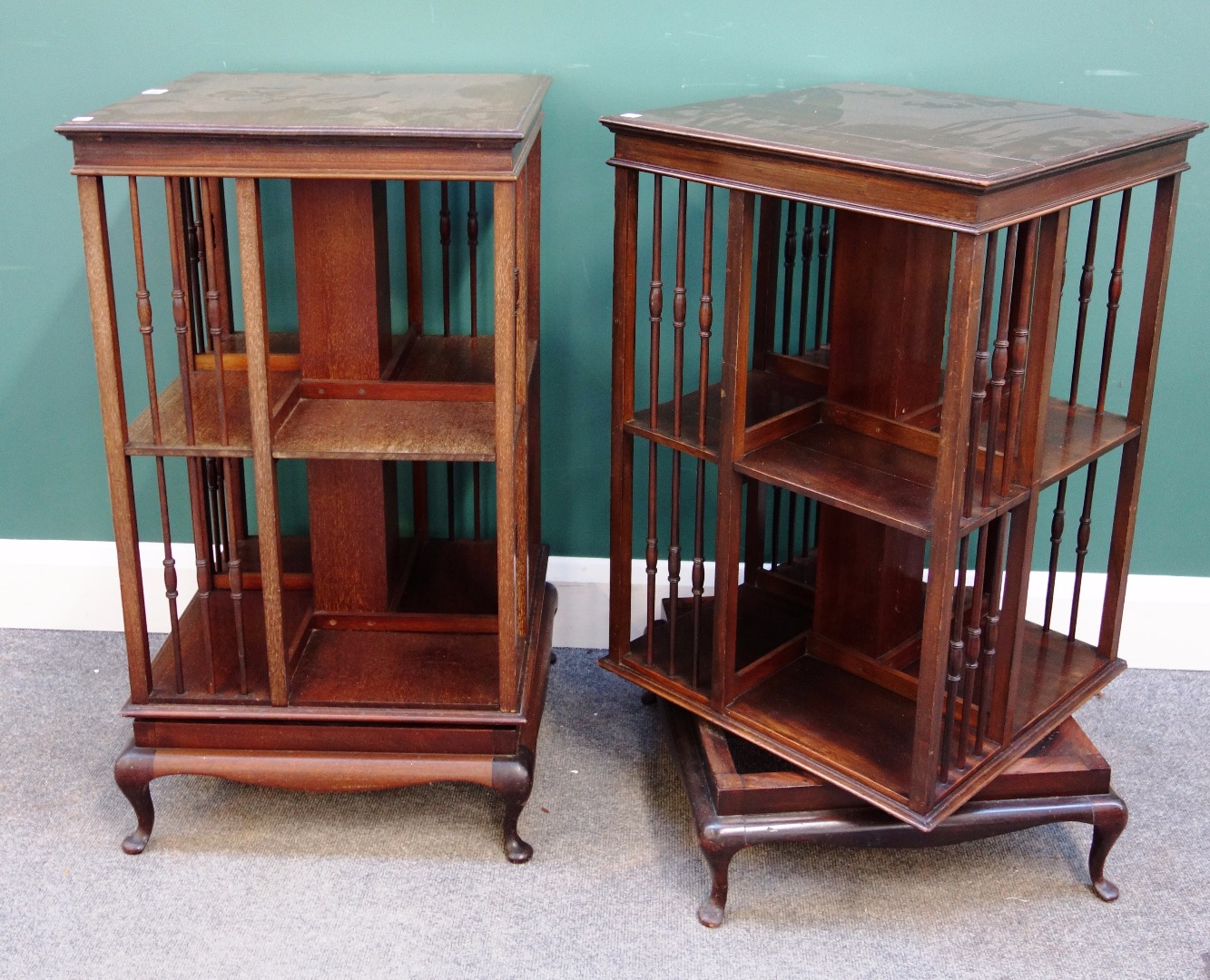 Appraisal: A pair of late th century mahogany revolving bookcases on