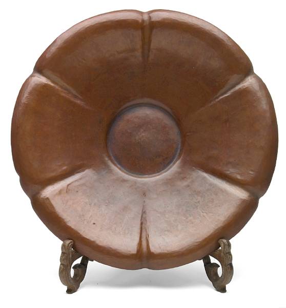 Appraisal: A Harry Dixon hammered copper Poppy charger s impressed HARRY