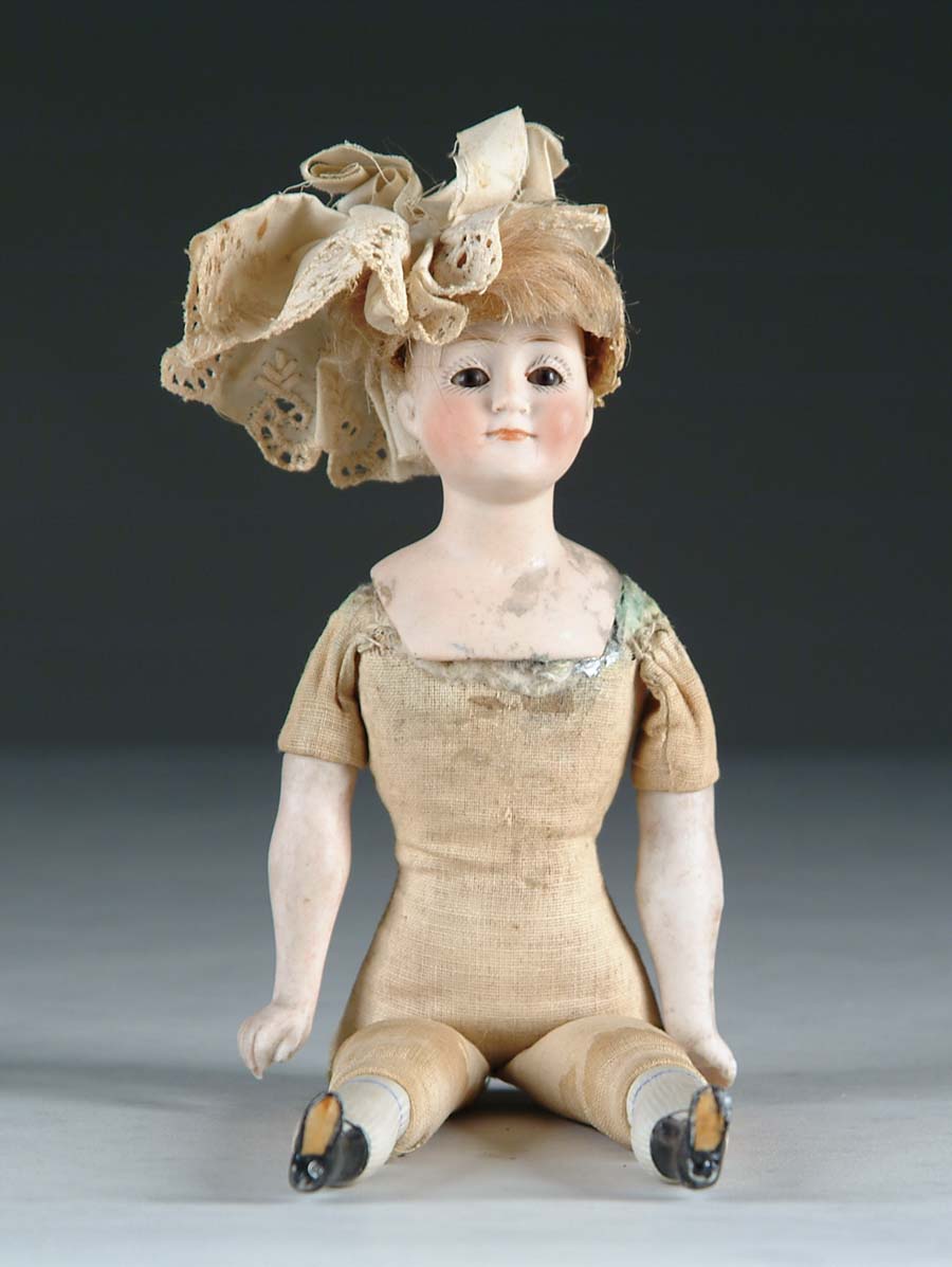 Appraisal: GIBSON GIRL DOLL A dollhouse style body cloth with bisque