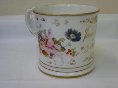 Appraisal: AN EARLY VICTORIAN PORCELAIN LARGE CYLINDRICAL CHRISTENING MUG inscribed in