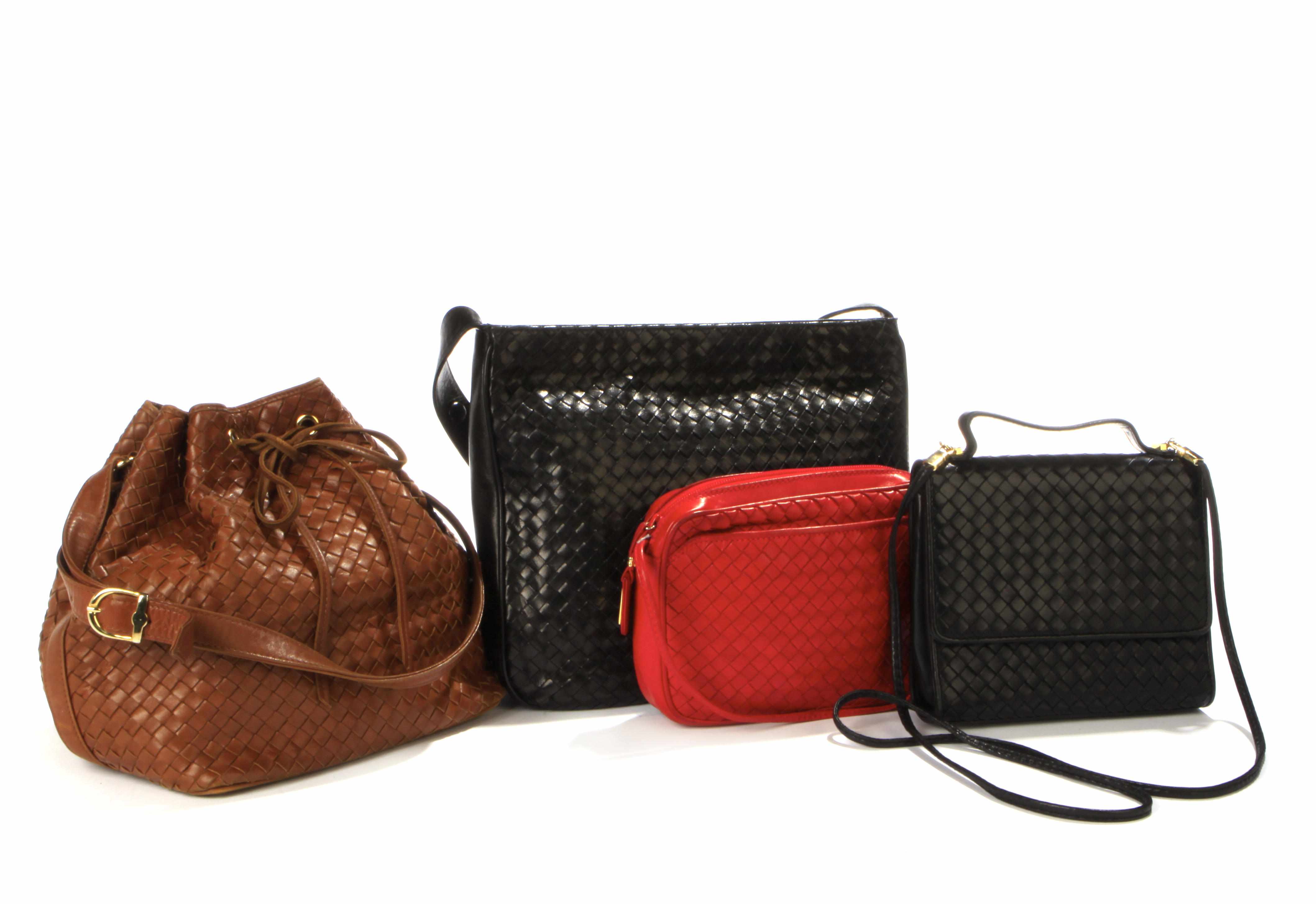 Appraisal: Three Charles Jourdan woven leather handbags together with another woven