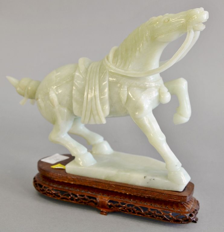 Appraisal: Light green jade carved horse on wood base total ht