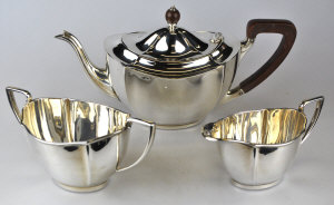 Appraisal: A silver three-piece tea service of shaped oval form Barker