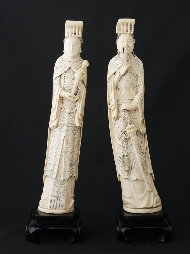 Appraisal: PAIR CARVED CHINESE IVORY ROYAL FIGURES pieces both with scrimshaw