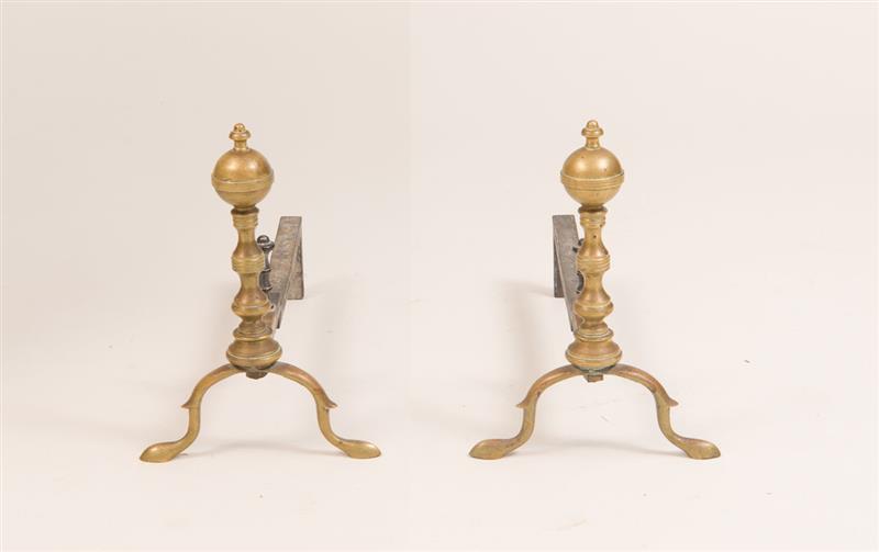 Appraisal: PAIR OF BRASS AND WROUGHT-IRON MACHINE-TURNED ANDIRONS Each with turned