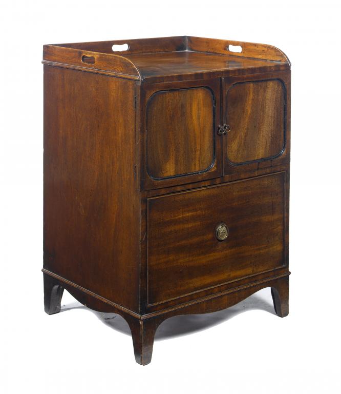 Appraisal: A GEORGE III MAHOGANY TRAY-TOP COMMODE enclosed by panelled doors