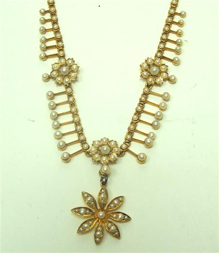 Appraisal: An Edwardian ct gold mounted seed pearl set necklace of