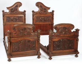 Appraisal: th c Italian carved walnut beds nightstands Pair of ornately