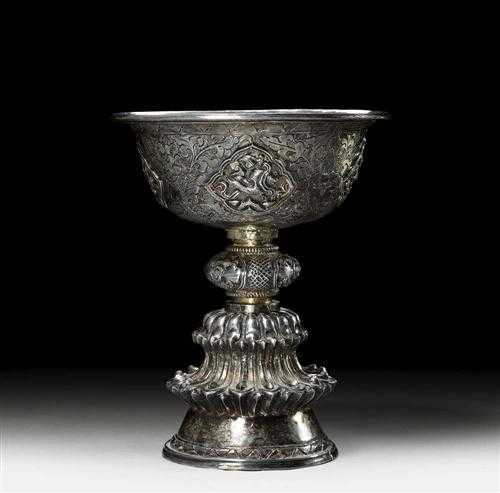 Appraisal: BUTTER LAMP Tibet H cm Chased and embossed silver with