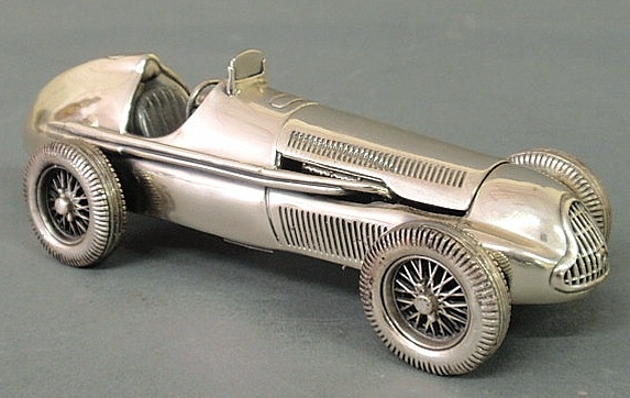 Appraisal: Silver model of a pre- Grand Prix race car marked