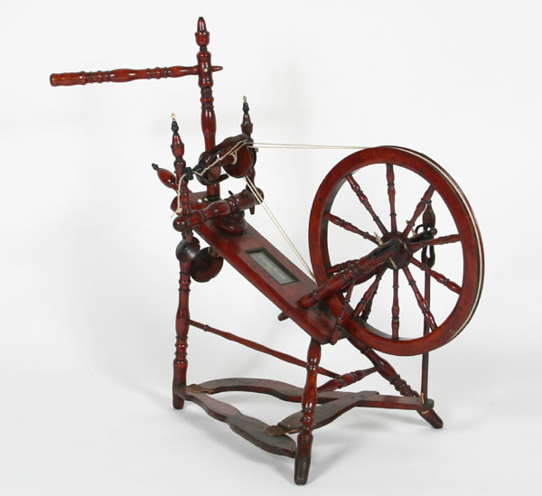 Appraisal: Child's spinning wheel with turned legs and arms bone accents