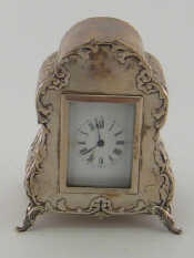 Appraisal: A late Victorian silver boudoir clock the French balance wheel