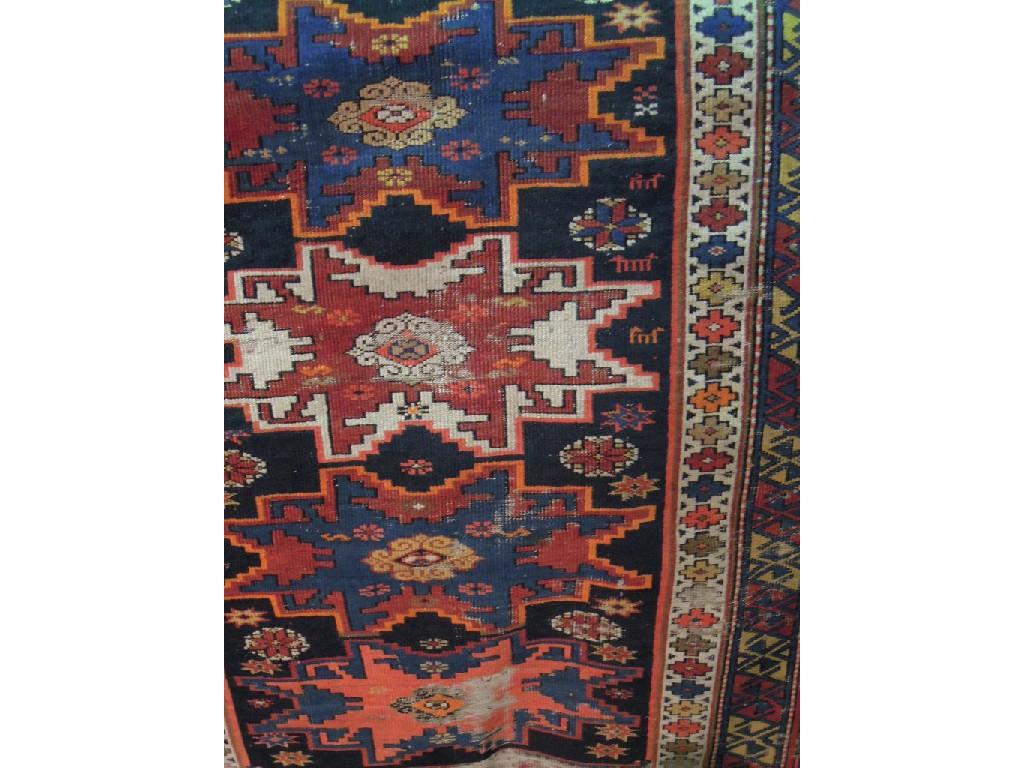 Appraisal: An old Middle Eastern carpet with a central panel with