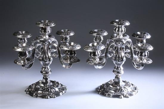 Appraisal: PAIR CAMUSSO STERLING SILVER FIVE-LIGHT CANDELABRA Industria Peruana Plata Esterling