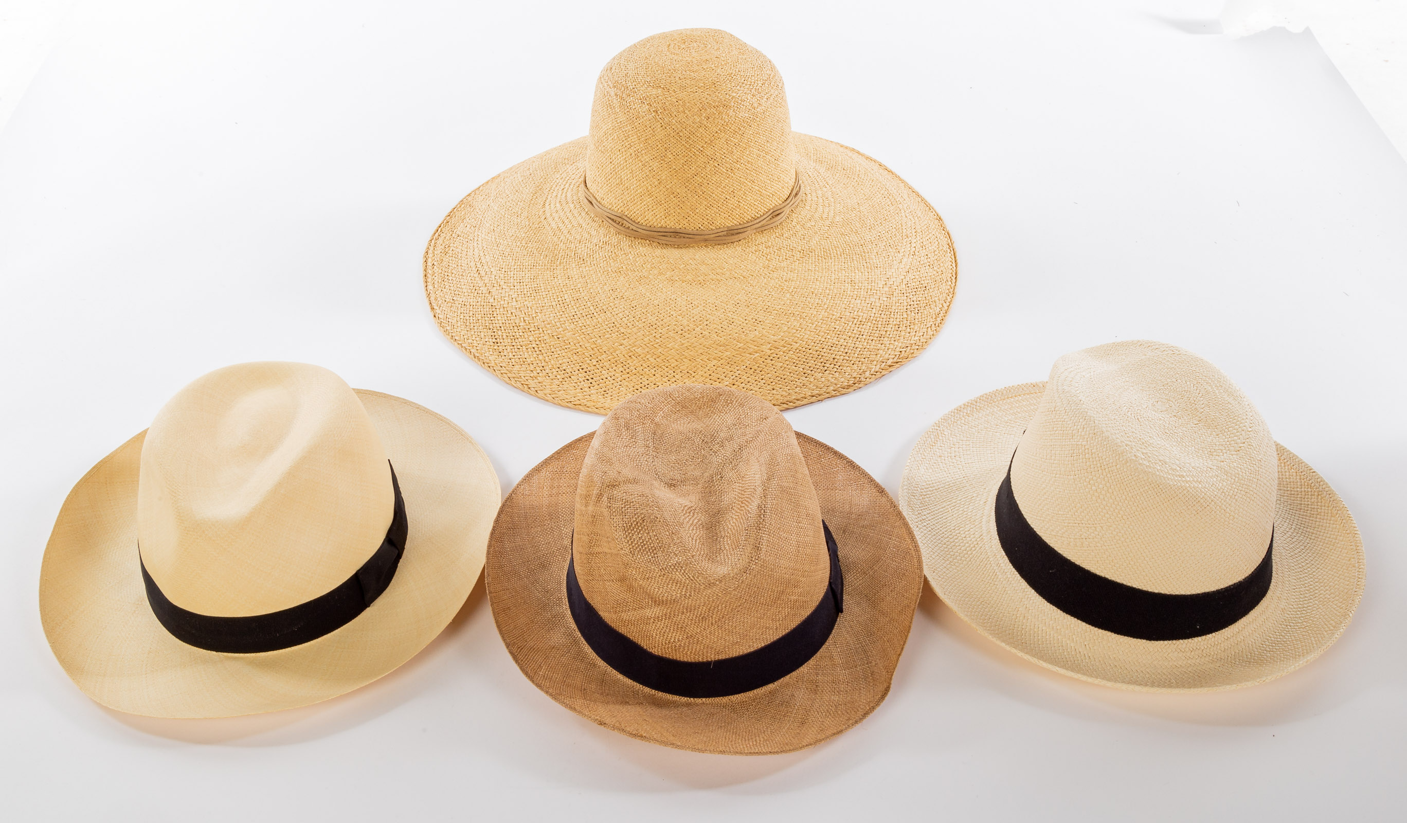 Appraisal: FOUR STRAW WOVEN LOCK CO HATS Lock Co Hatters St