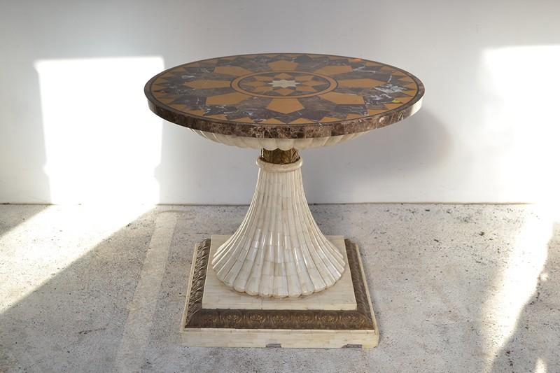 Appraisal: AN IMPRESSIVE CIRCULAR MARBLE TABLE ON CLASSICAL PEDESTAL BASE AN