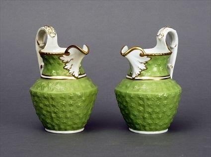 Appraisal: Pair of English Green-Ground Gilt Decorated Porcelain Pitchers in in