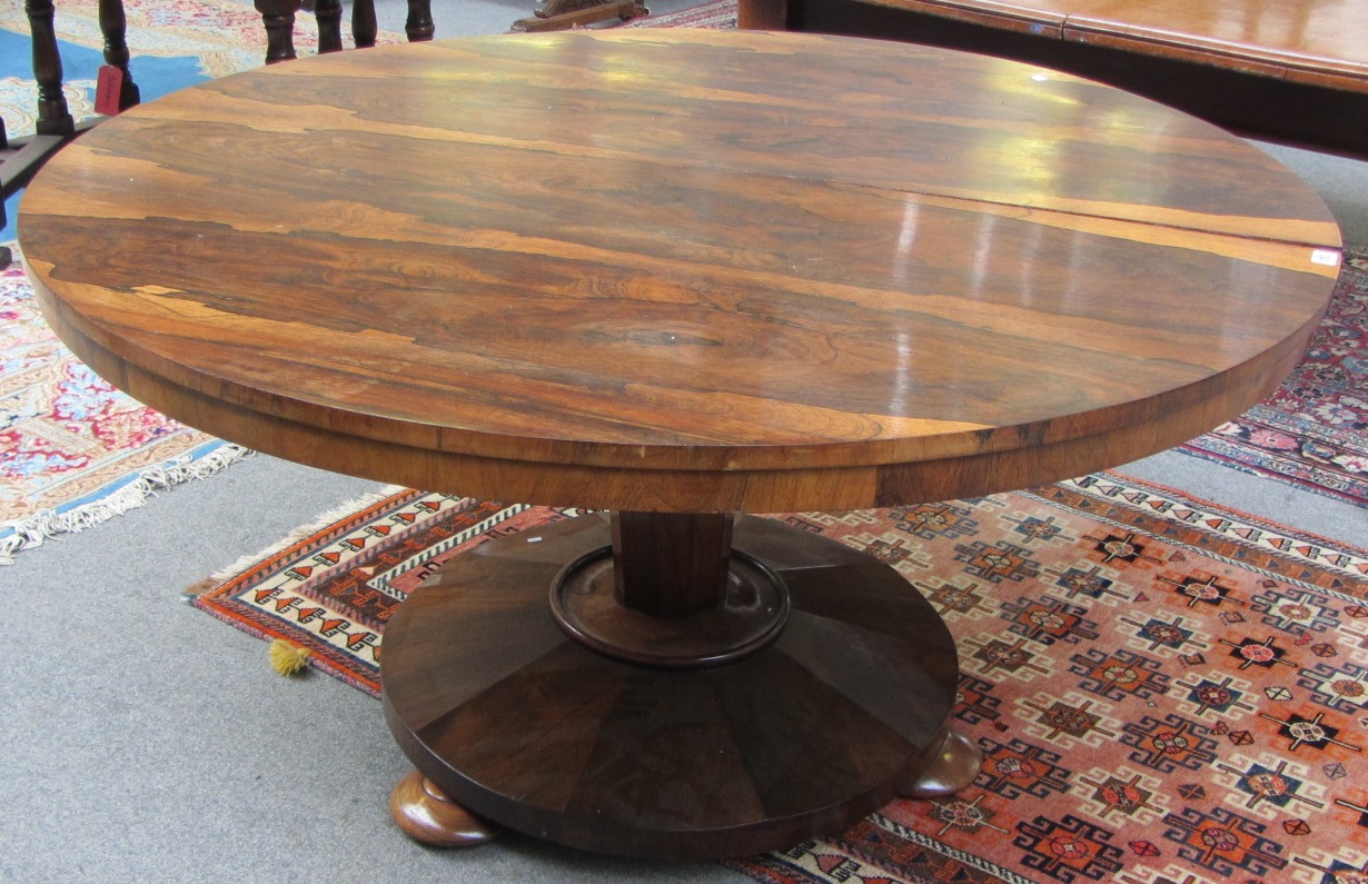 Appraisal: A William IV rosewood breakfast table the circular snap top