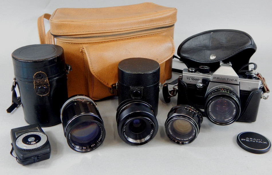 Appraisal: A Praktica Super TL camera and various lens etc