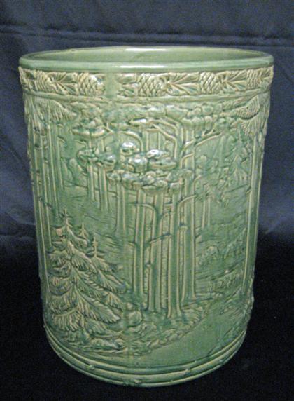 Appraisal: Umbrella stand th century Green glaze molded forest design with