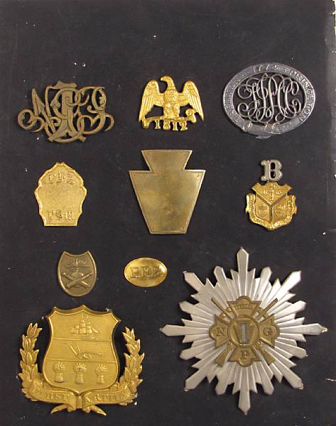 Appraisal: A group of Pennsylvania militia cap and accoutrement plates Comprising