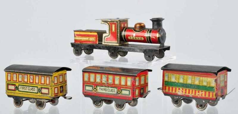 Appraisal: Tin Litho Train Set Penny Toy Japanese Includes steam engine