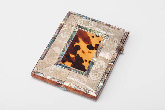 Appraisal: A VICTORIAN MOTHER OF PEARL AND TORTOISESHELL DECORATED CARD CASE