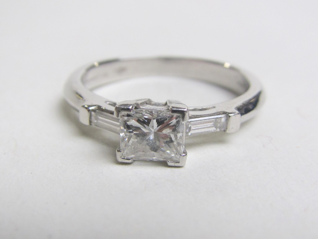 Appraisal: Platinum diamond three stone ring with central princess cut diamond