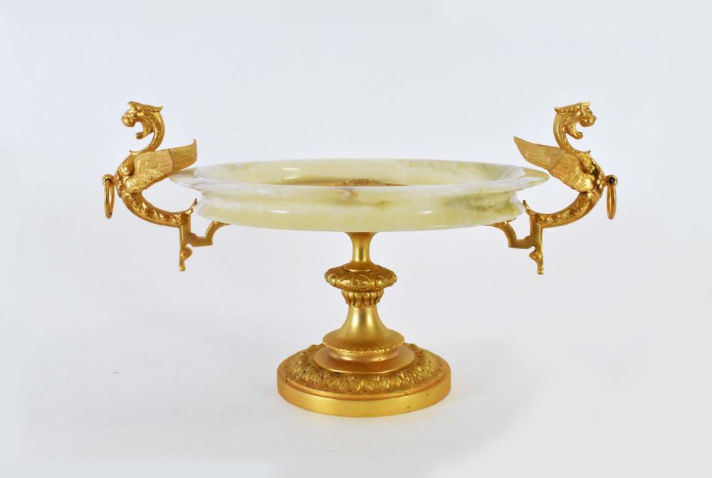 Appraisal: FRENCH GILT BRONZE MOUNTED ONYX TAZZAThe onyx dish-shaped bowl with