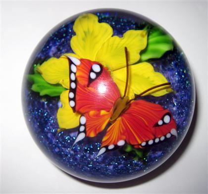 Appraisal: Mayauel Ward butterfly magnum paperweight With a vibrant orange butterfly