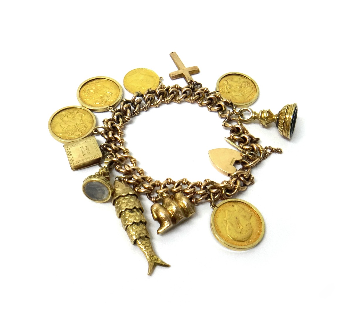 Appraisal: A gold multiple link bracelet with a gold heart shaped