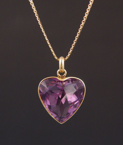 Appraisal: CT HEART SHAPED AMETHYST PENDANT K yellow gold pendant contains