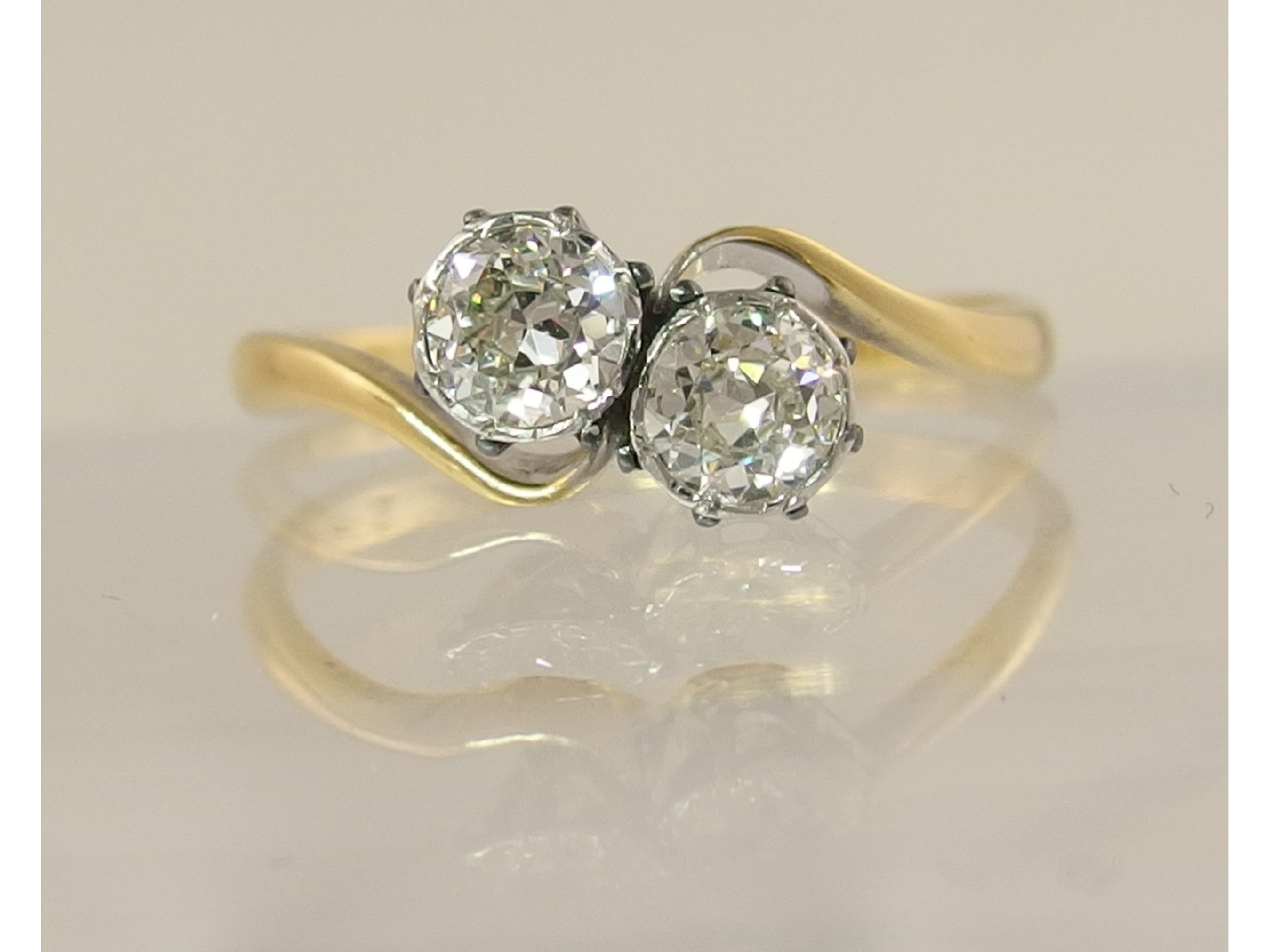 Appraisal: An ct gold and platinum old cut twin stone diamond