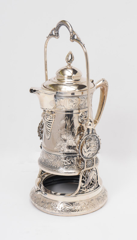 Appraisal: VICTORIAN SILVER PLATED ICE WATER TIPPLER Engraved and embossed floral