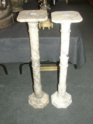 Appraisal: Two variegated marble pedestals with turned columnar supports and octagonal