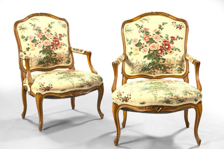 Appraisal: Pair of Louis XV-Style Fruitwood Fauteuils early th century each