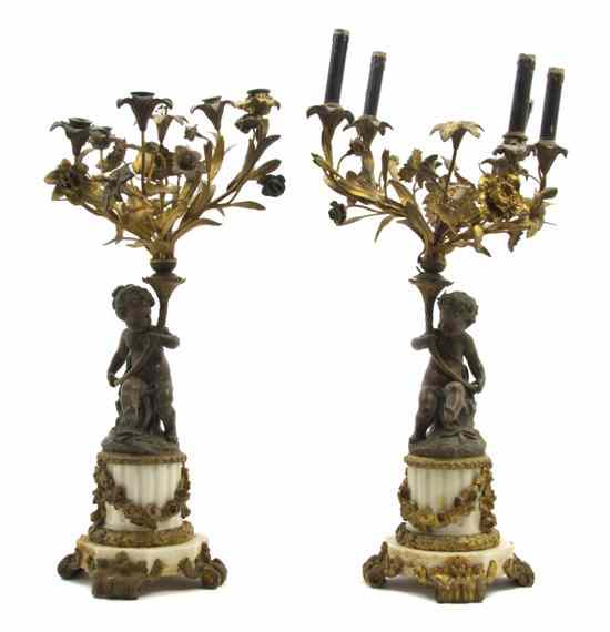 Appraisal: A Pair of Continental Gilt Metal and Alabaster Five-Light Figural