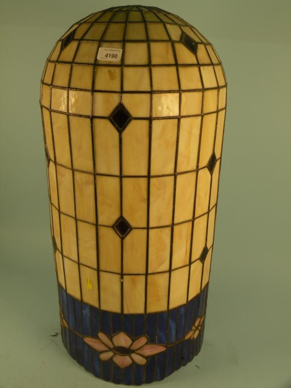 Appraisal: A Tiffany style wall light with stained leaded glass