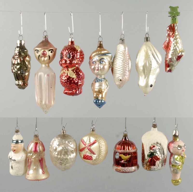 Appraisal: Lot of Figural Christmas Ornaments Description Includes fish people frog