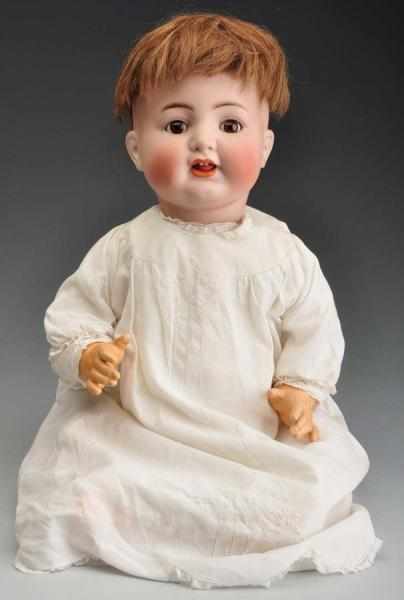 Appraisal: Large K R Character Baby Doll Description German bisque socket