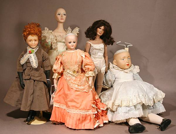 Appraisal: Grouping of Reproduction dolls A staged doll ensemble of contemporary