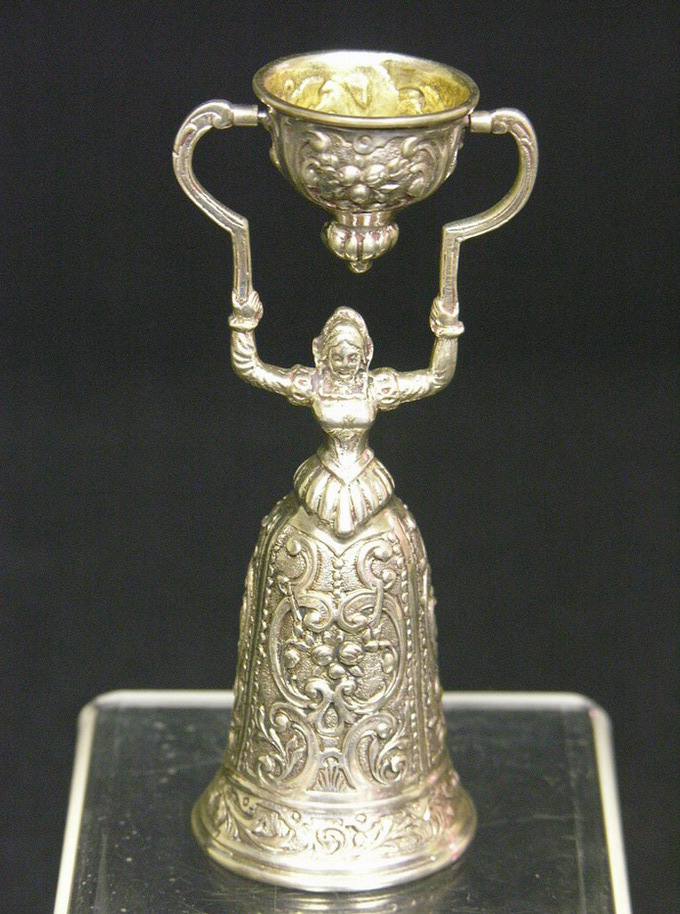 Appraisal: SILVER FIGURAL CANDLE SNUFFER h